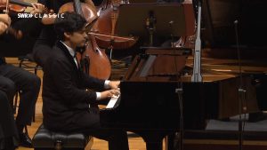 Accompanied by the SWR Symphonieorchester Stuttgart, Christopher Park performs Mozart Piano Concerto No. 23 in A major (K. 488). Conductor: Christoph Eschenbach