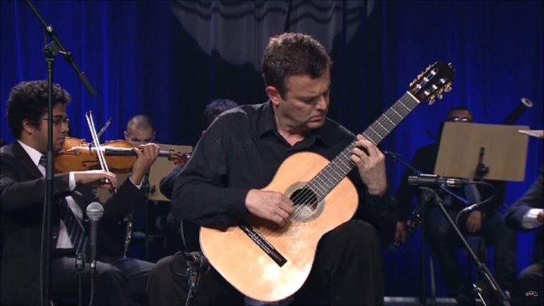 Paulo Martelli performs Guitar Concerto, W501 (piano reduction: W502), a piece for solo guitar and small orchestra written by the Brazilian composer Heitor Villa-Lobos