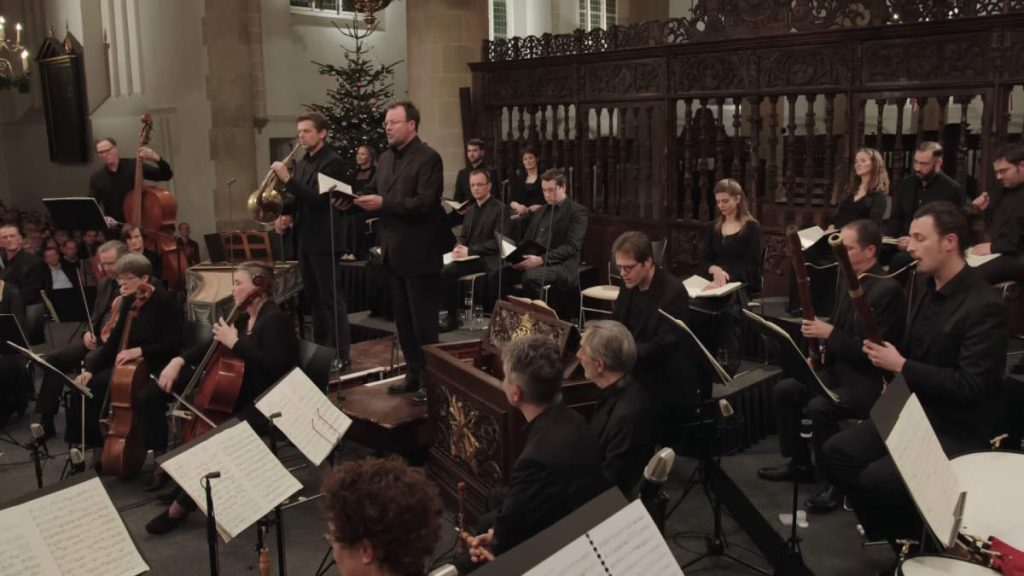 Conducted by Jos van Veldhoven, the Netherlands Bach Society performs Johann Sebastian Bach's "Mass in B minor, BWV 232", a musical setting of the complete Ordinary of the Latin Mass. This performance was recorded for the Netherlands Bach Society's project All of Bach on December 15, 2016, at the Grote Kerk, Naarden.